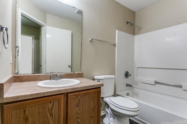 2131 Wood Rnch, San Antonio, TX 78227 - bathroom featuring a textured wall, toilet,  shower combination, and vanity