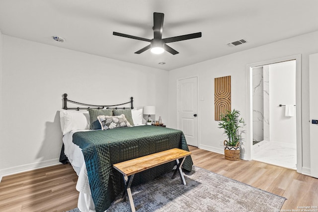 bedroom featuring light wood-style floors, baseboards, a ceiling fan, and visible vents