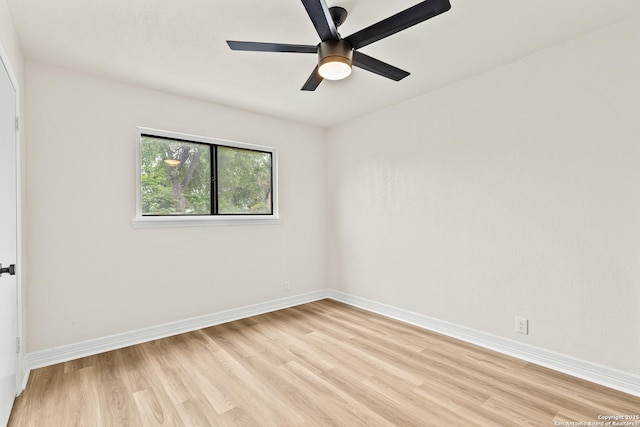 unfurnished room with light wood-style floors, baseboards, and ceiling fan