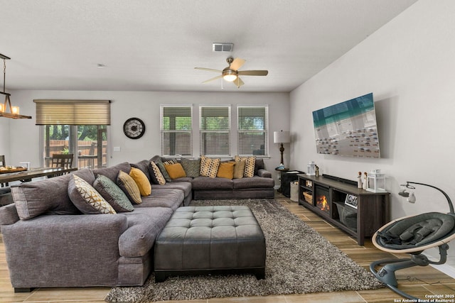 7914 Blackhawk Pass, San Antonio, TX 78253 - living room with ceiling fan and wood finished floors