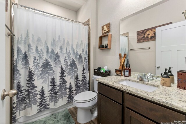 7914 Blackhawk Pass, San Antonio, TX 78253 - bathroom featuring toilet, vanity, wood finished floors, and curtained shower