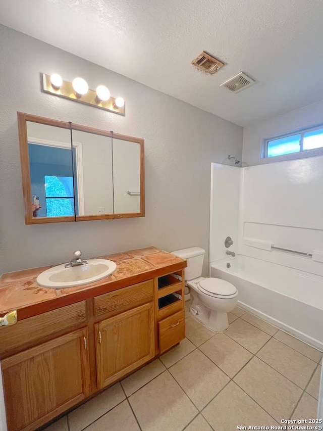 full bathroom with visible vents, tile patterned floors, toilet, and vanity