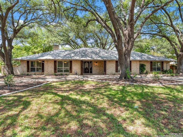 105 Sheffield, San Antonio, TX 78213 - ranch-style house with a chimney, brick siding, and a front lawn