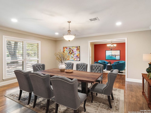 105 Sheffield, San Antonio, TX 78213 - dining room with crown molding, a chandelier, wood finished floors, baseboards, and recessed lighting