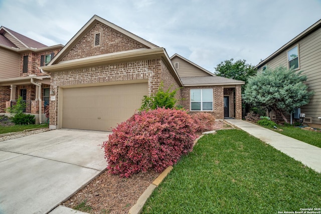 view of front of property with a garage, a front yard, driveway, and brick siding
