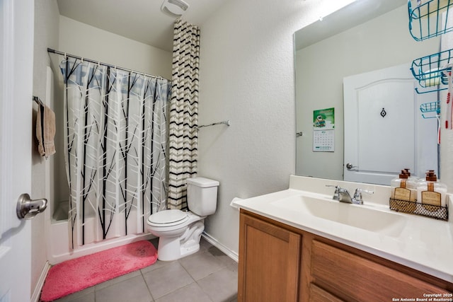 full bathroom featuring vanity, toilet, shower / bath combo with shower curtain, tile patterned floors, and baseboards