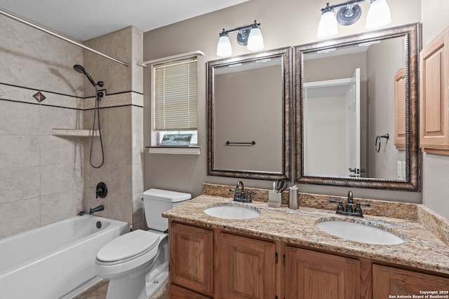 17926 Autumn Knl, San Antonio, TX 78258 - bathroom with toilet, bathtub / shower combination, double vanity, and a sink