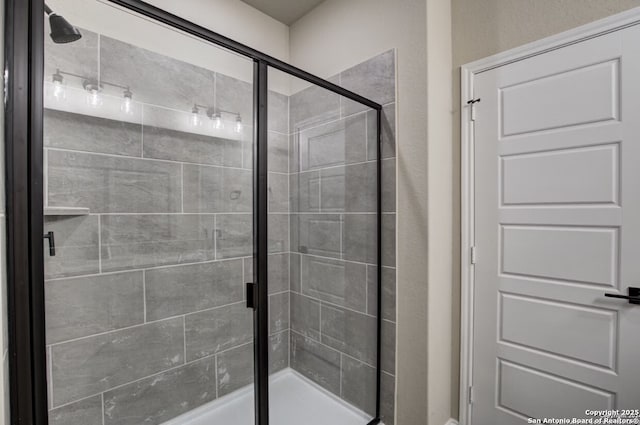 full bathroom with a shower stall