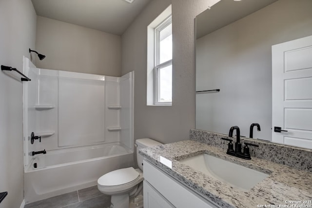 bathroom with vanity, tile patterned flooring, bathtub / shower combination, and toilet