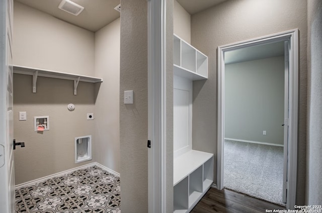 laundry room featuring laundry area, visible vents, baseboards, electric dryer hookup, and hookup for a gas dryer
