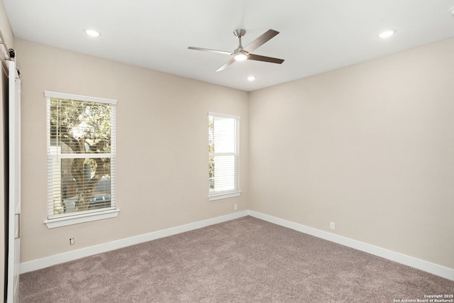 carpeted empty room with baseboards, ceiling fan, and recessed lighting