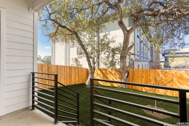 view of gate with fence