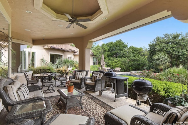 view of patio with outdoor lounge area, a ceiling fan, and outdoor dining space