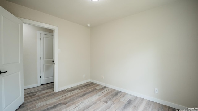 5806 Gillis, San Antonio, TX 78240 - unfurnished room with light wood-type flooring and baseboards