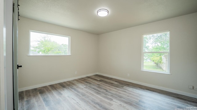 5806 Gillis, San Antonio, TX 78240 - empty room with baseboards and wood finished floors