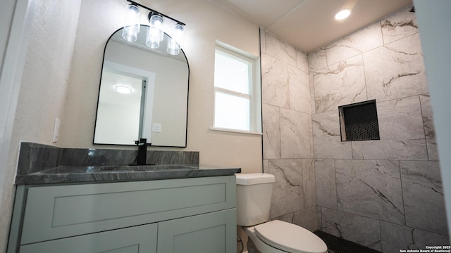 5806 Gillis, San Antonio, TX 78240 - full bath featuring vanity, a tile shower, and toilet