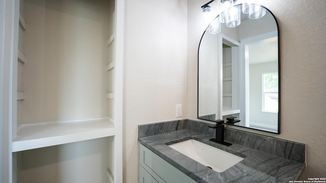 5806 Gillis, San Antonio, TX 78240 - bathroom featuring vanity and a textured wall