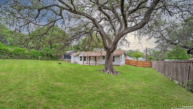 5806 Gillis, San Antonio, TX 78240 - view of yard featuring a patio and a fenced backyard