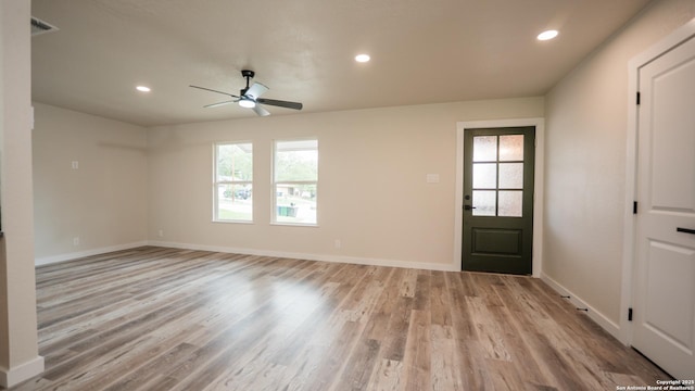 5806 Gillis, San Antonio, TX 78240 - empty room featuring a healthy amount of sunlight, baseboards, a ceiling fan, and light wood-style flooring
