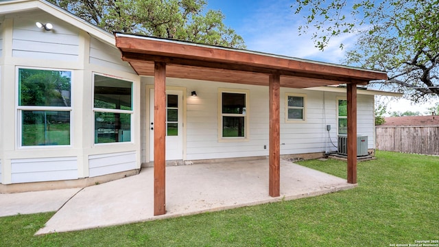 5806 Gillis, San Antonio, TX 78240 - back of house featuring a lawn, fence, a patio, and cooling unit