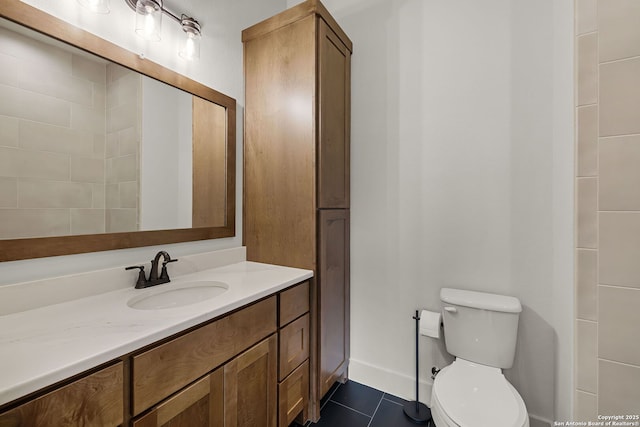 182 Torrey, New Braunfels, TX 78130 - bathroom with toilet, vanity, and tile patterned floors