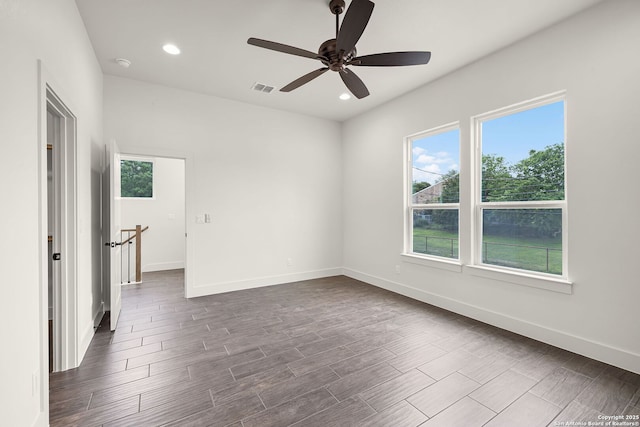 182 Torrey, New Braunfels, TX 78130 - spare room featuring a ceiling fan, baseboards, dark wood-style floors, recessed lighting, and a smoke detector