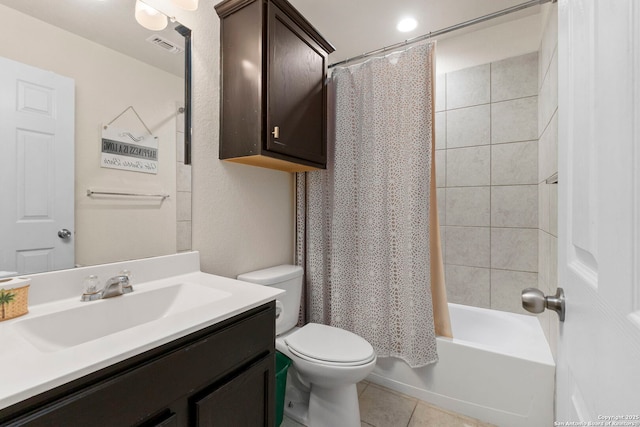 full bathroom featuring shower / bath combo, vanity, toilet, tile patterned floors, and visible vents