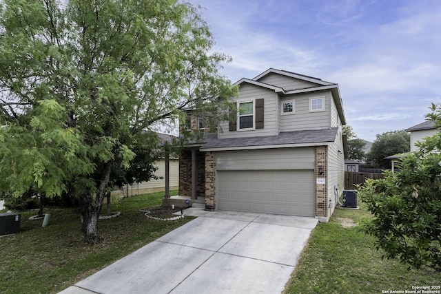 1843 Gray Fox, San Antonio, TX 78245 - view of front of house featuring driveway, brick siding, central AC, fence, and an attached garage