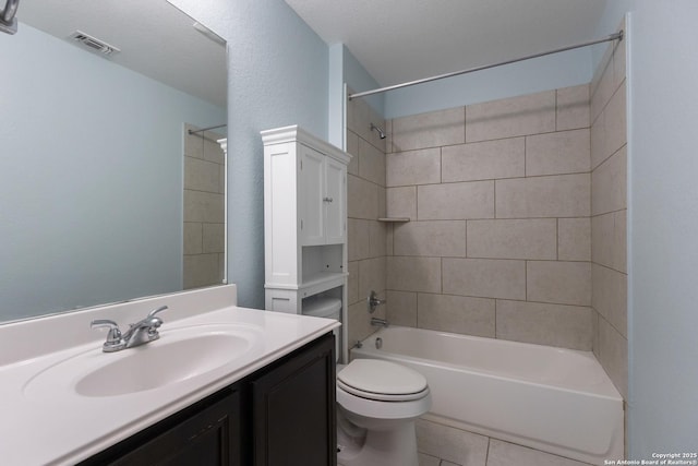 1843 Gray Fox, San Antonio, TX 78245 - bathroom with tile patterned flooring, vanity, toilet, shower / washtub combination, and visible vents