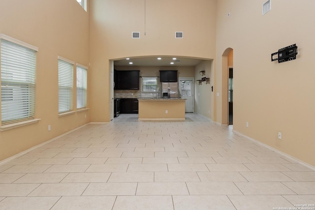 1843 Gray Fox, San Antonio, TX 78245 - unfurnished living room with visible vents and plenty of natural light