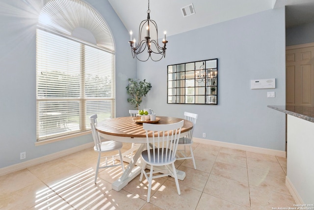 dining area featuring an inviting chandelier, light tile patterned floors, baseboards, and visible vents