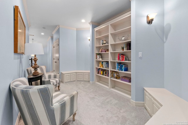 living area with recessed lighting, crown molding, and light carpet