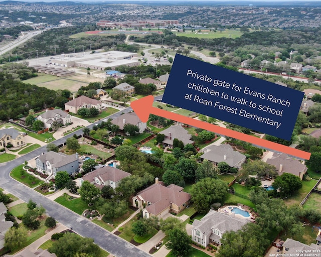 birds eye view of property featuring a residential view