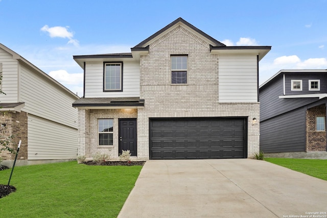 view of front of home with an attached garage, driveway, a front lawn, and brick siding