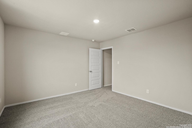 unfurnished room featuring carpet floors, recessed lighting, baseboards, and visible vents