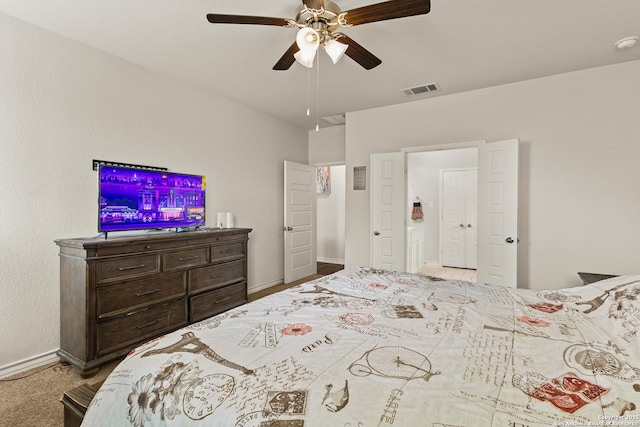 bedroom with baseboards, ceiling fan, and visible vents