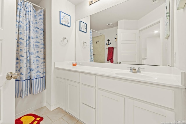 bathroom featuring tile patterned floors, visible vents, a shower with shower curtain, and vanity