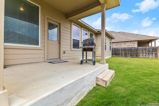 view of patio with fence