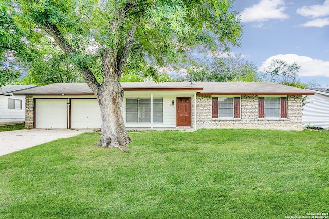 7442 Castle Trail Dr, San Antonio, TX 78218 - ranch-style house featuring a garage, driveway, and a front yard