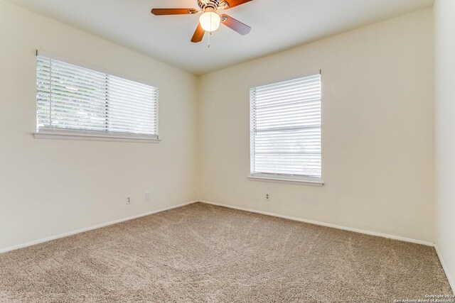 7442 Castle Trail Dr, San Antonio, TX 78218 - spare room featuring carpet floors, ceiling fan, and baseboards