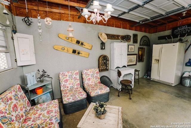 living room with unfinished concrete flooring