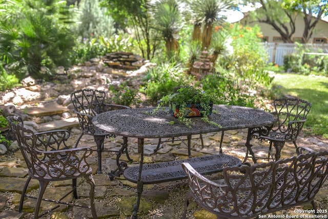 view of patio / terrace featuring fence