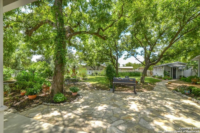 view of patio featuring fence
