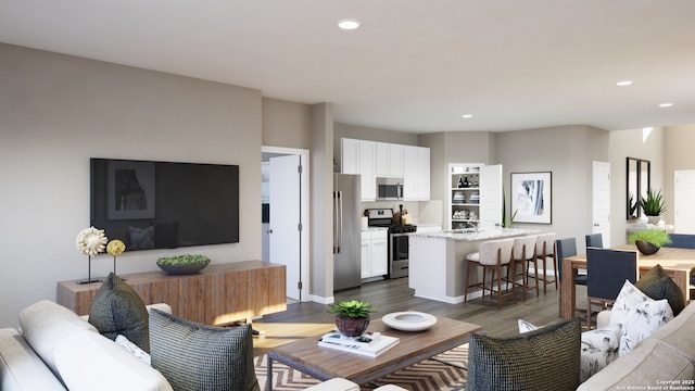 living room featuring recessed lighting and dark wood-type flooring