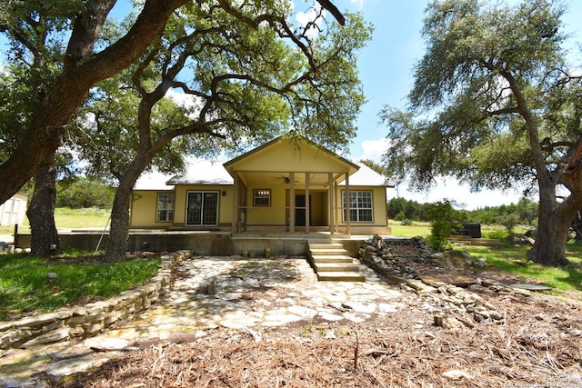 view of front of property with covered porch and ceiling fan