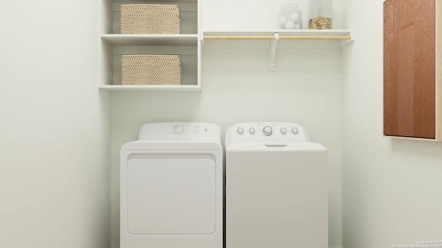laundry room featuring laundry area and washing machine and clothes dryer