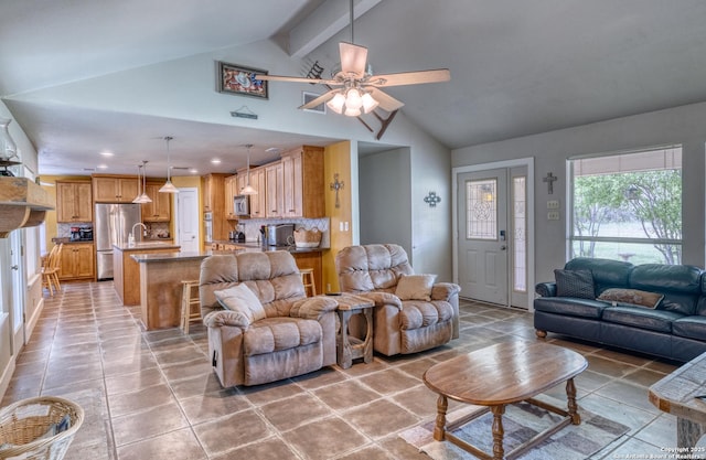 living room featuring beamed ceiling, high vaulted ceiling, recessed lighting, a ceiling fan, and light tile patterned floors
