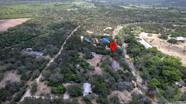 aerial view with a wooded view