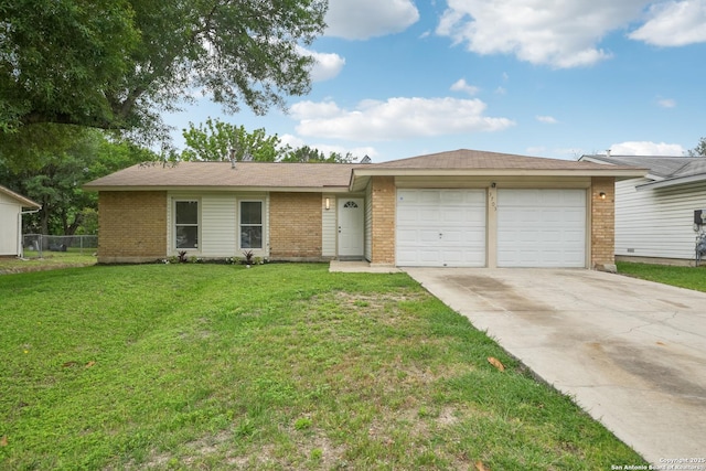single story home with fence, brick siding, a garage, a front yard, and concrete driveway
