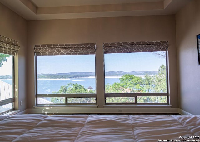 bedroom with a water view
